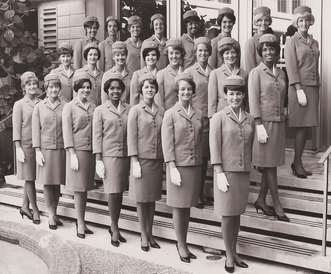 1967, June, Class photo on the steps of the Pan Am training facility Miami.  Venice Fernandez , front row, third from left.  Forth from left is Beverly Holness.  Olive Perry is in the middle row, first on right.  Joan Crawford is in the top row, forth from right .  These four women were all hired by Pan Am in Jamaica.  Friend & roomate, Bernadette Degroote is also in the top row, third from left.